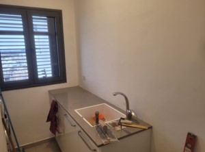 חיפוי קרמיקה בחדר כביסה